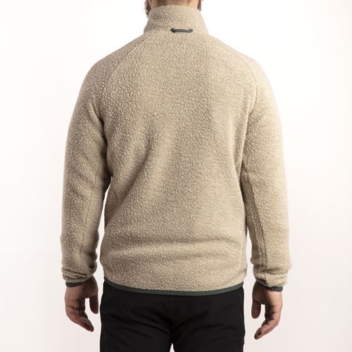 A person wearing a brown sweater.