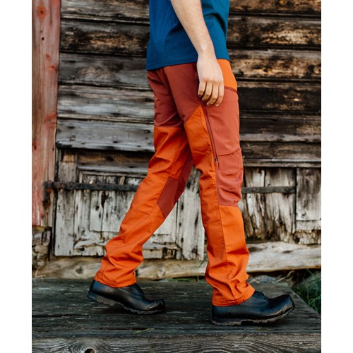 A person wearing orange pants.