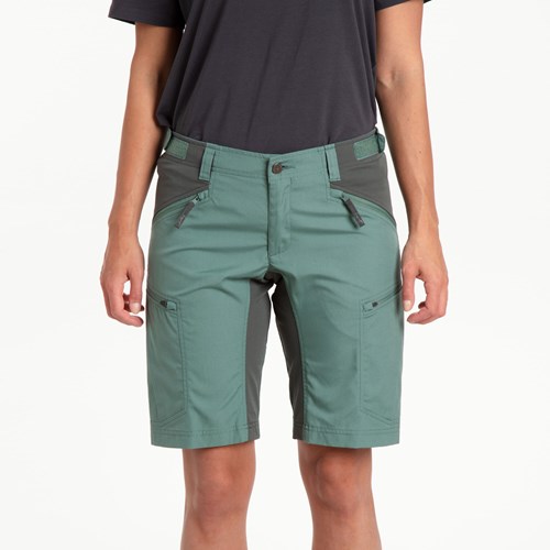 A person wearing green shorts.
