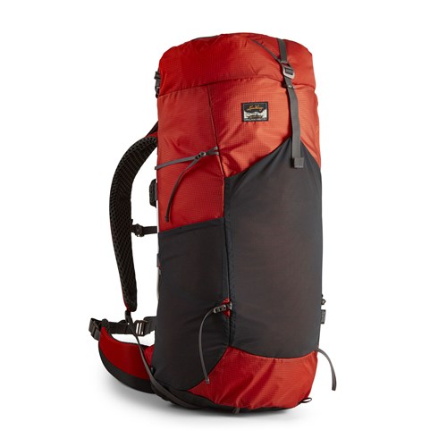 A red backpack with straps.